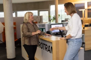 Two women arranging transport for sensitive goods