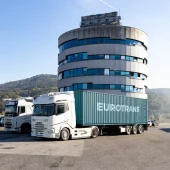 Eurotrans logistics company from Austria with trucks parking in front of the building